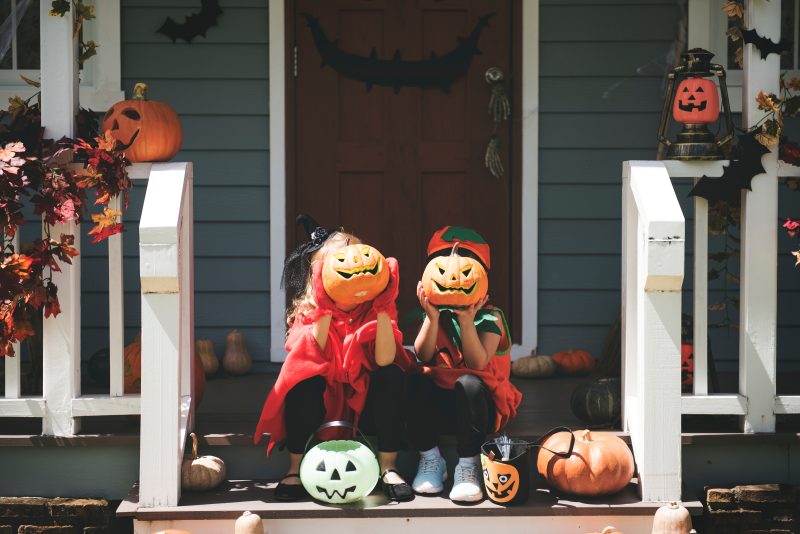 Children trick or treating on Halloween.